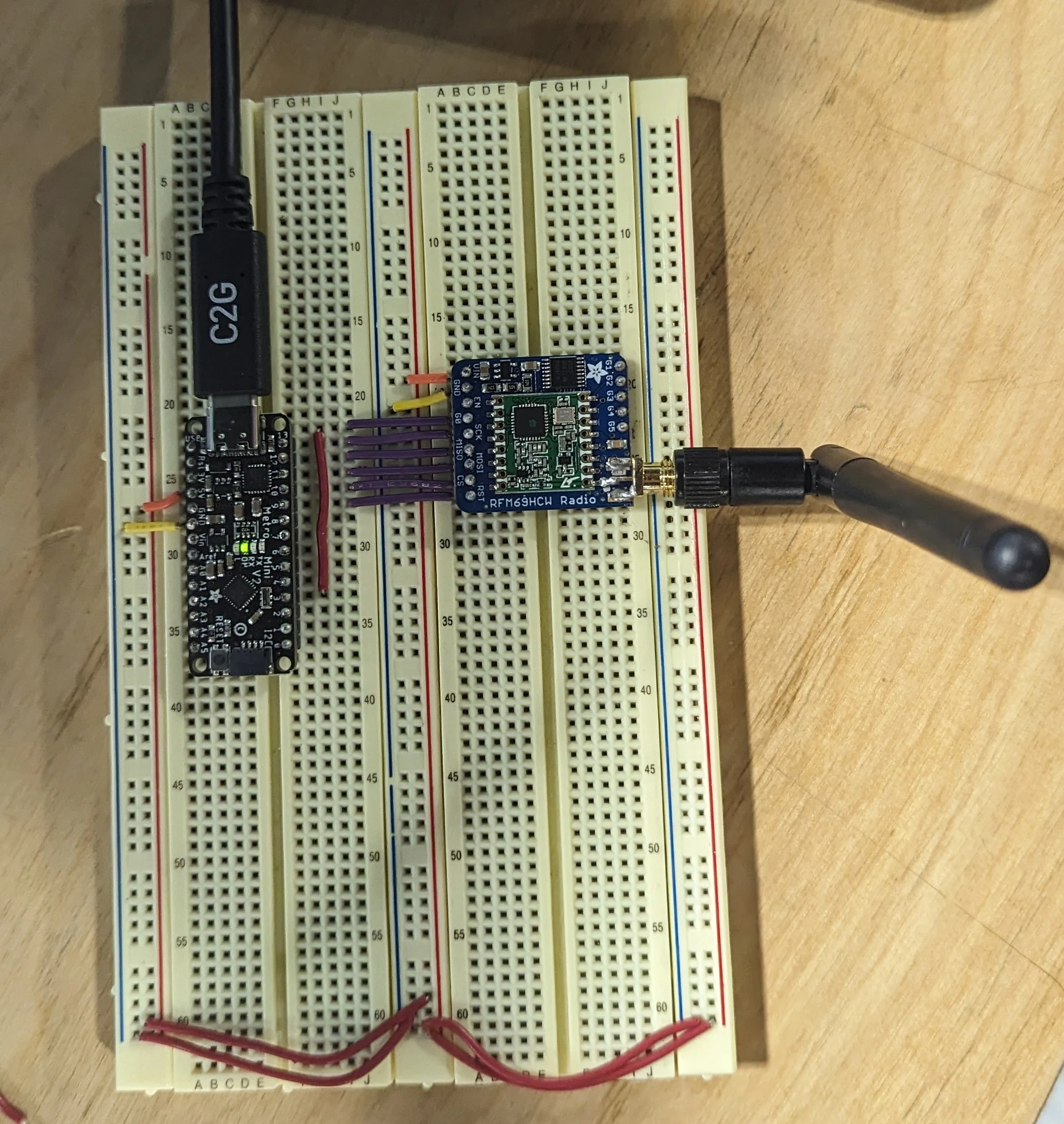 Image of wired breadboard with RFM69HCW radio and Adafruit Metro Mini Microcontroller