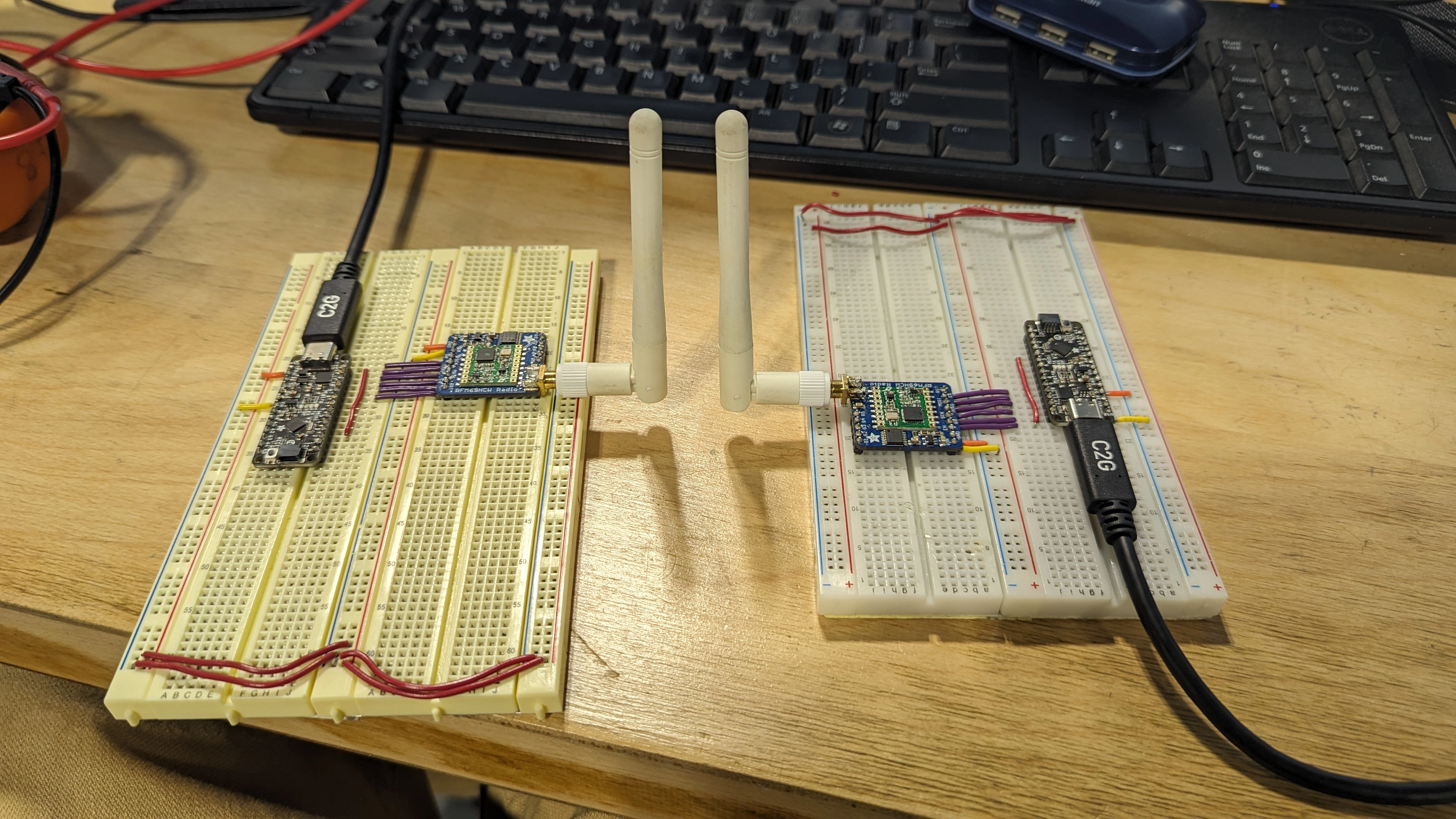 Range test of radios connected to breadboard with anntena attached